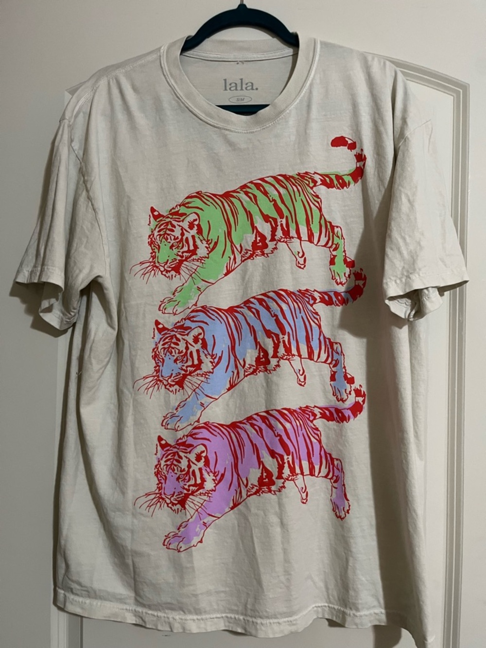 Dressed in Lala Graphic Tiger Trio Tee in Cream with Neon Accents. Oversized S/M